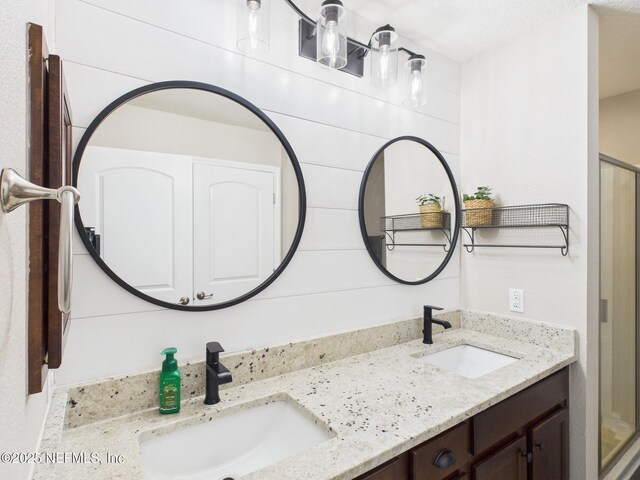 88137 Maybourne Rd, Yulee, FL 32097 - full bathroom with double vanity and a shower stall