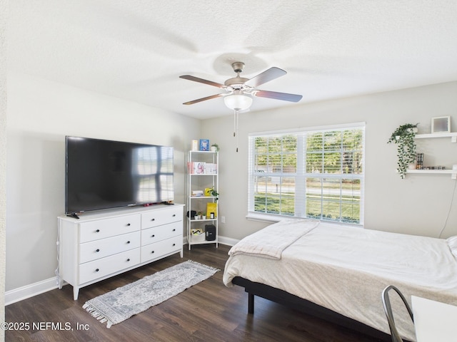 88137 Maybourne Rd, Yulee, FL 32097 - bedroom featuring dark wood-style floors, baseboards, and ceiling fan