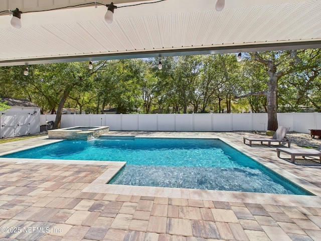 88137 Maybourne Rd, Yulee, FL 32097 - view of pool featuring a patio area, a fenced backyard, and a pool with connected hot tub