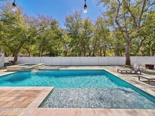 88137 Maybourne Rd, Yulee, FL 32097 - view of swimming pool featuring a patio, a fenced backyard, and a pool with connected hot tub