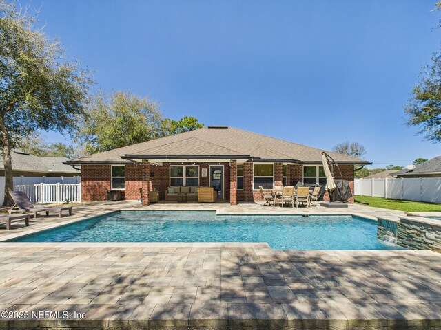 88137 Maybourne Rd, Yulee, FL 32097 - view of pool with outdoor lounge area, a fenced backyard, a patio, and outdoor dining area