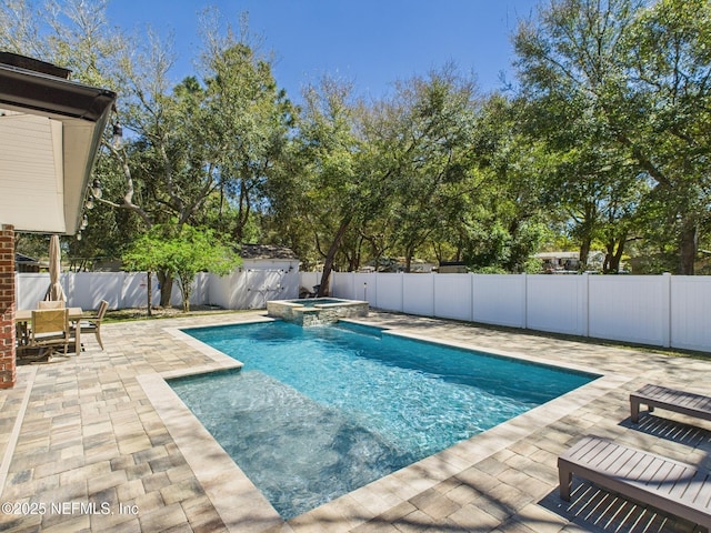88137 Maybourne Rd, Yulee, FL 32097 - view of pool with a patio area, a fenced backyard, and a pool with connected hot tub