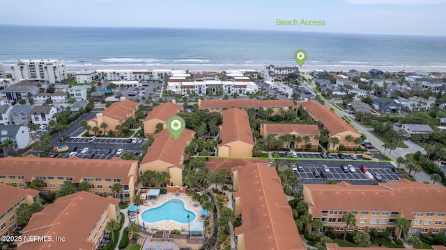 104 Laguna Villas Blvd Unit F33, Jacksonville Beach, FL 32250 - drone / aerial view of a large body of water and a pool area