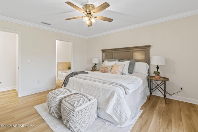 104 Laguna Villas Blvd Unit F33, Jacksonville Beach, FL 32250 - bedroom featuring baseboards, ornamental molding, light wood finished floors, a ceiling fan, and ensuite bath