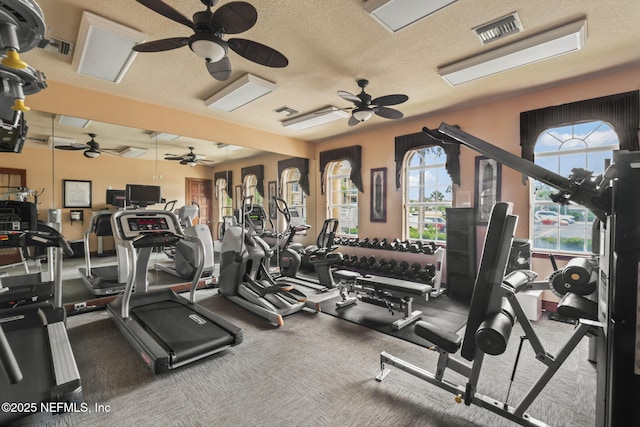 104 Laguna Villas Blvd Unit F33, Jacksonville Beach, FL 32250 - workout area with a ceiling fan and a textured ceiling