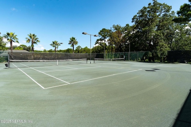 3653 Oglebay Dr, Green Cove Springs, FL 32043 - view of tennis court with community basketball court