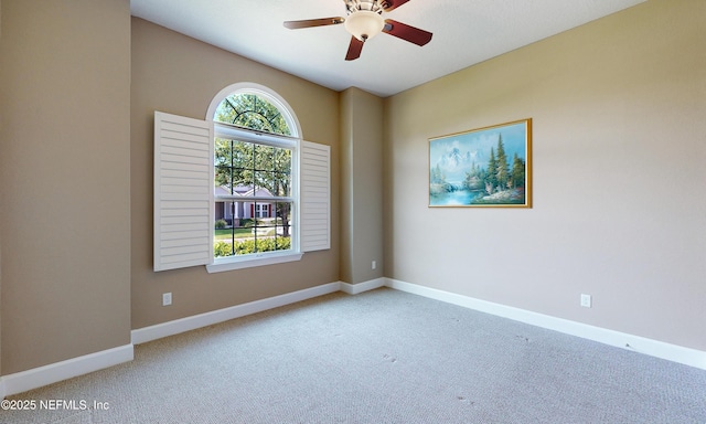 3653 Oglebay Dr, Green Cove Springs, FL 32043 - spare room with carpet floors, a ceiling fan, and baseboards