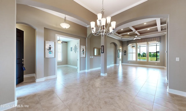 3653 Oglebay Dr, Green Cove Springs, FL 32043 - empty room featuring arched walkways, crown molding, healthy amount of natural light, a ceiling fan, and a chandelier
