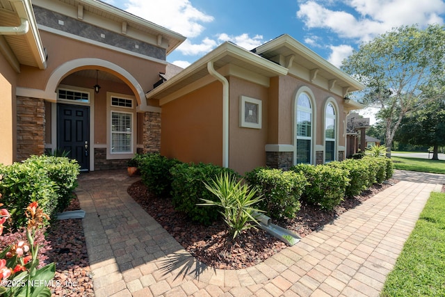 3653 Oglebay Dr, Green Cove Springs, FL 32043 - entrance to property with stone siding and stucco siding