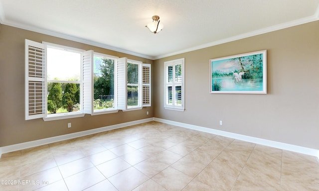 3653 Oglebay Dr, Green Cove Springs, FL 32043 - empty room with ornamental molding, plenty of natural light, baseboards, and light tile patterned flooring