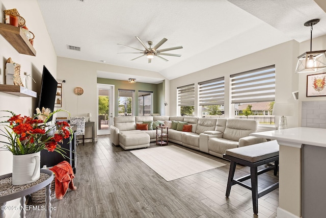 212 Foxcross Ave, Saint Johns, FL 32092 - living area with ceiling fan, wood finished floors, and a textured ceiling