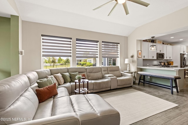 212 Foxcross Ave, Saint Johns, FL 32092 - living area featuring a ceiling fan, plenty of natural light, light wood-style floors, lofted ceiling, and recessed lighting