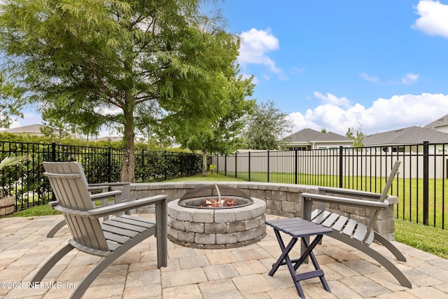 212 Foxcross Ave, Saint Johns, FL 32092 - fenced backyard featuring an outdoor fire pit and a patio