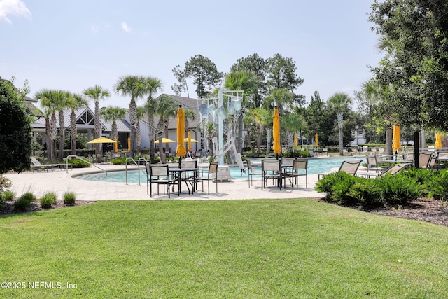 212 Foxcross Ave, Saint Johns, FL 32092 - view of community with a lawn, a pool, and a patio area