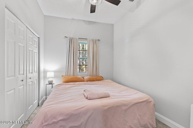 3040 Rosselle St, Jacksonville, FL 32205 - carpeted bedroom with a closet, baseboards, and a ceiling fan
