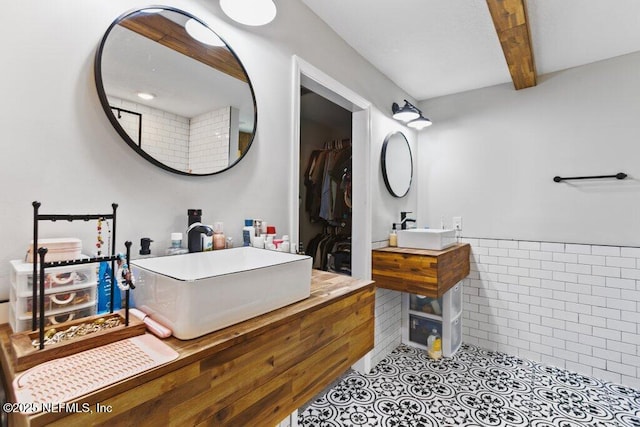 3040 Rosselle St, Jacksonville, FL 32205 - full bath with beamed ceiling, tile patterned flooring, and vanity