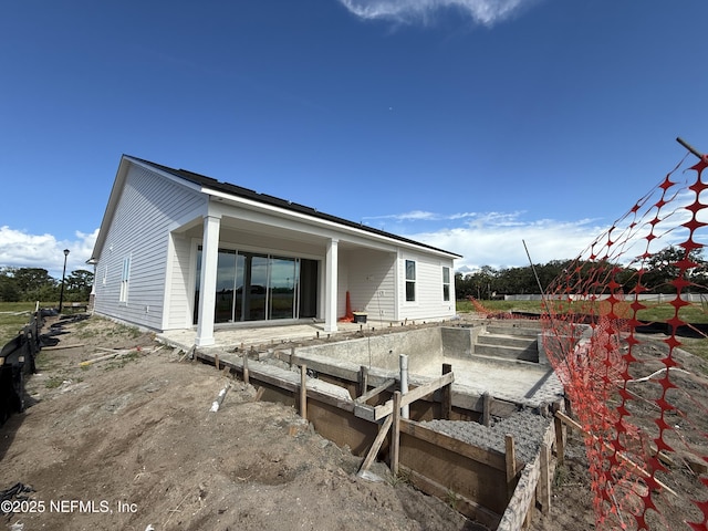572 Maralinda Dr, Saint Augustine, FL 32095 - back of property with a patio