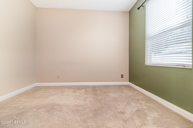 12373 Shell Beach Trl, Jacksonville, FL 32246 - spare room featuring light colored carpet and baseboards