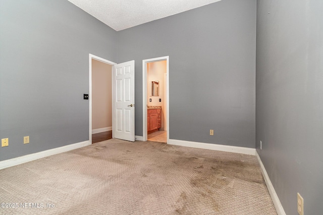 12373 Shell Beach Trl, Jacksonville, FL 32246 - unfurnished bedroom featuring light carpet and connected bathroom