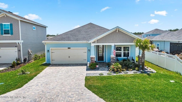 154 Pine Candle Way, Saint Augustine, FL 32092 - craftsman-style house featuring decorative driveway and an attached garage