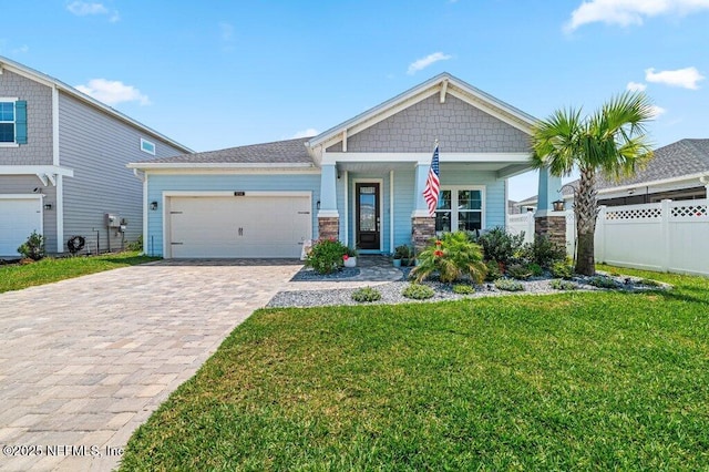 154 Pine Candle Way, Saint Augustine, FL 32092 - craftsman house with decorative driveway and an attached garage
