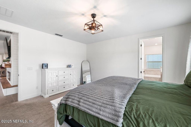 154 Pine Candle Way, Saint Augustine, FL 32092 - bedroom with carpet, baseboards, and connected bathroom