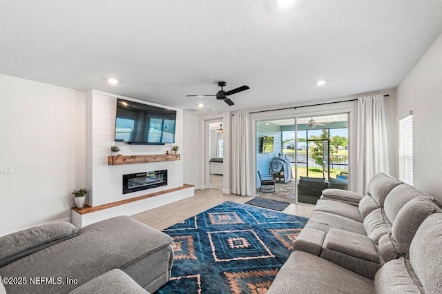 154 Pine Candle Way, Saint Augustine, FL 32092 - living area featuring ceiling fan, a fireplace, wood finished floors, and recessed lighting
