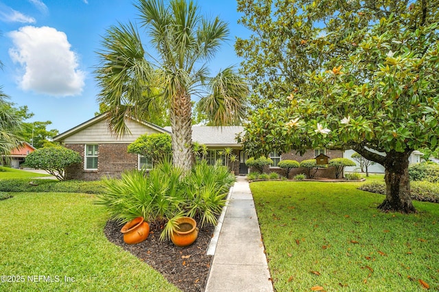 11019 Crumpet Ct, Jacksonville, FL 32257 - view of front of property featuring a front lawn and brick siding