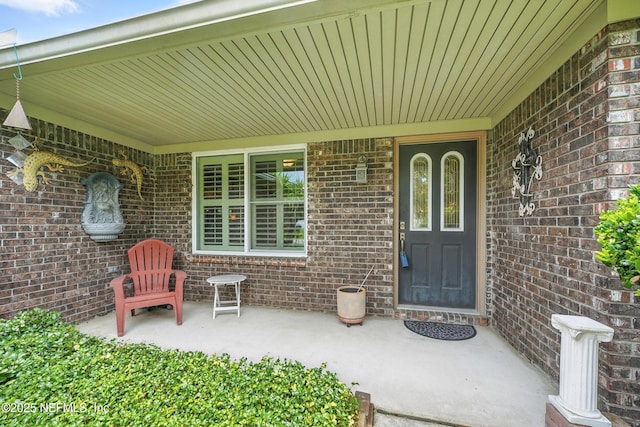 11019 Crumpet Ct, Jacksonville, FL 32257 - view of exterior entry featuring brick siding