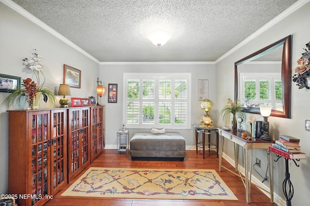 11019 Crumpet Ct, Jacksonville, FL 32257 - sitting room with hardwood / wood-style floors, a textured ceiling, crown molding, and baseboards
