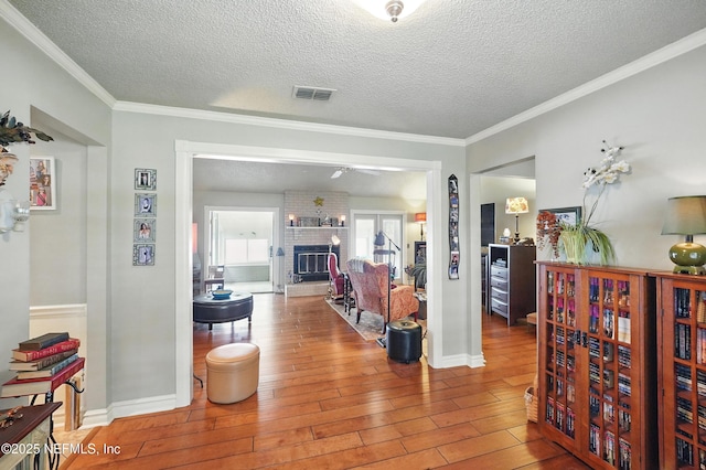 11019 Crumpet Ct, Jacksonville, FL 32257 - corridor with hardwood / wood-style flooring, ornamental molding, a textured ceiling, and baseboards