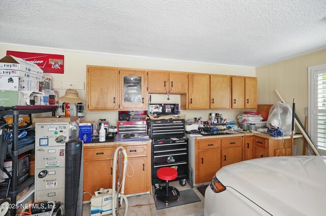 11019 Crumpet Ct, Jacksonville, FL 32257 - kitchen featuring a textured ceiling and tile counters