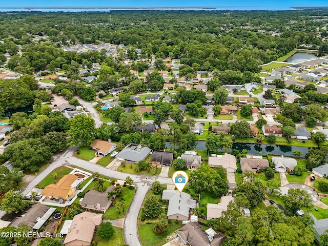 11019 Crumpet Ct, Jacksonville, FL 32257 - aerial view of residential area featuring a nearby body of water and a forest