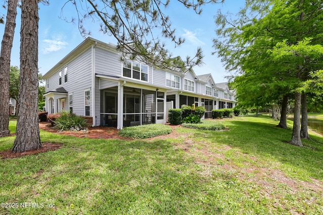 3724 Windmaker Way, Jacksonville, FL 32224 - rear view of property with a sunroom, a yard, and ceiling fan