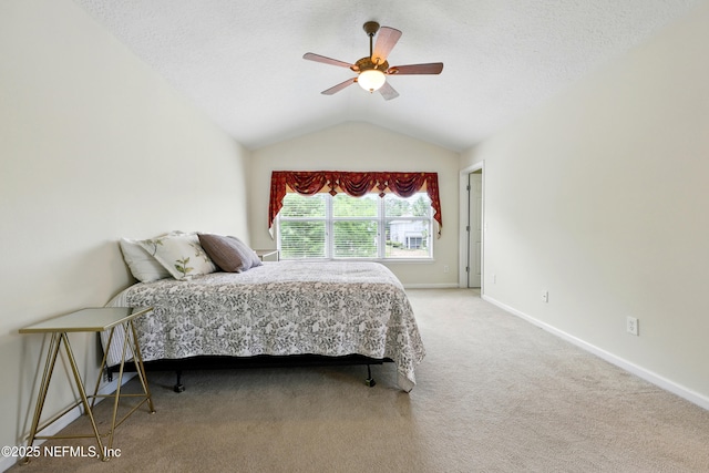 3724 Windmaker Way, Jacksonville, FL 32224 - bedroom with lofted ceiling, carpet floors, baseboards, ceiling fan, and a textured ceiling