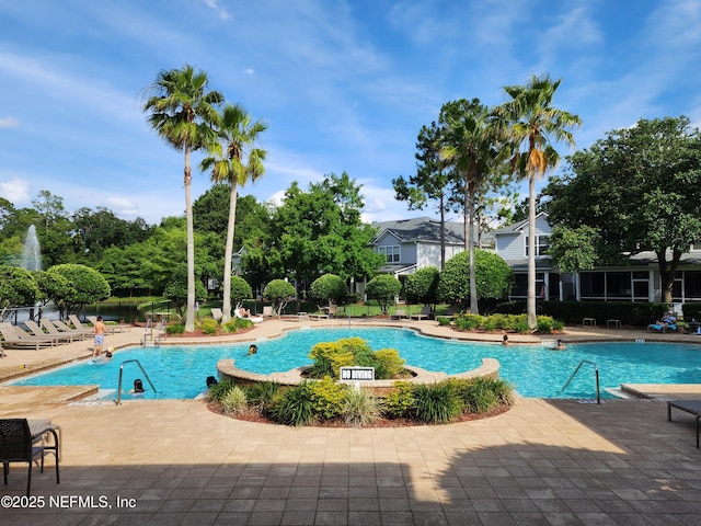 3724 Windmaker Way, Jacksonville, FL 32224 - community pool featuring a patio area