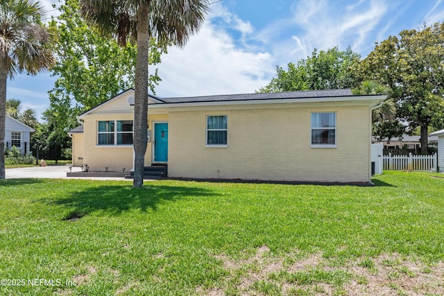 536 14th Ave N, Jacksonville Beach, FL 32250 - view of front facade featuring entry steps and brick siding