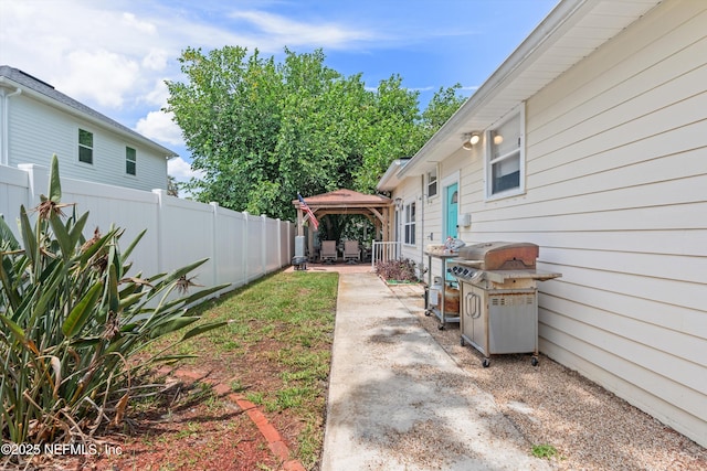 536 14th Ave N, Jacksonville Beach, FL 32250 - fenced backyard with a gazebo and a patio area