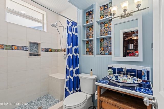 536 14th Ave N, Jacksonville Beach, FL 32250 - bathroom featuring toilet, a tile shower, and vanity