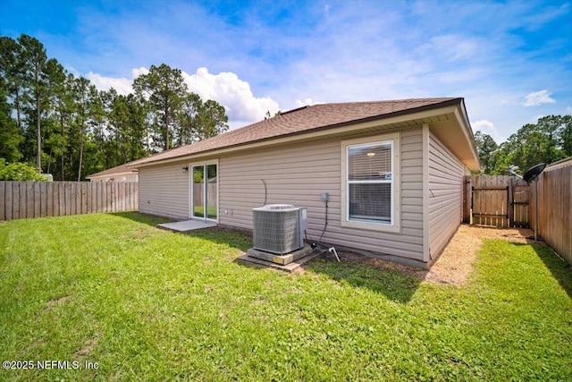 86045 Harrahs Pl, Yulee, FL 32097 - rear view of house with cooling unit
