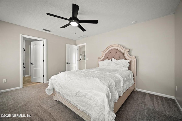 86045 Harrahs Pl, Yulee, FL 32097 - bedroom featuring carpet floors, baseboards, a ceiling fan, and a textured ceiling