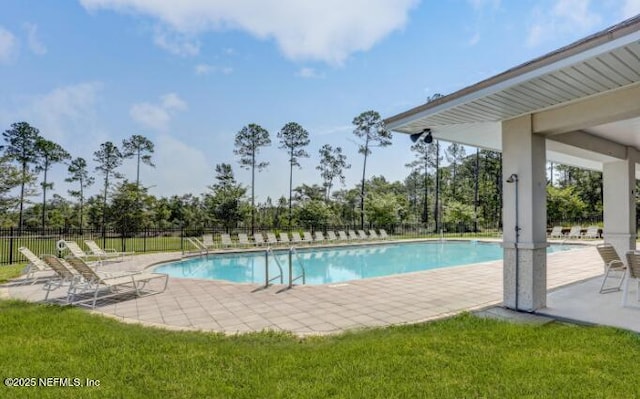 86045 Harrahs Pl, Yulee, FL 32097 - community pool with a patio area