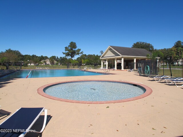 2478 Country Club Blvd, Orange Park, FL 32073 - community pool featuring a patio