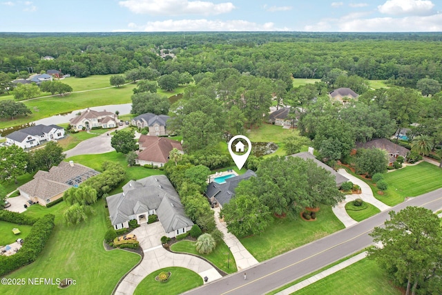 2478 Country Club Blvd, Orange Park, FL 32073 - aerial view of residential area featuring a heavily wooded area