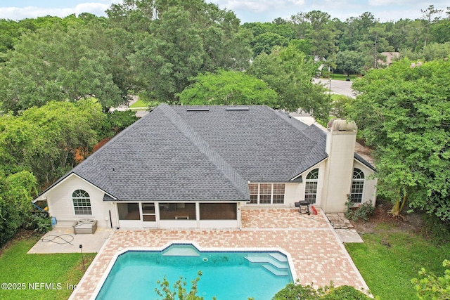 2478 Country Club Blvd, Orange Park, FL 32073 - outdoor pool featuring a sunroom and a patio