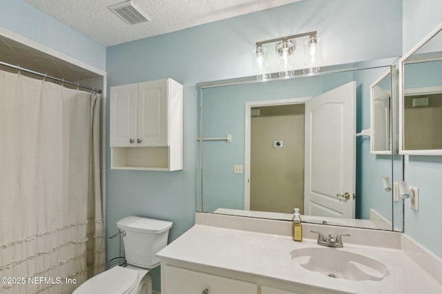 2478 Country Club Blvd, Orange Park, FL 32073 - full bathroom with toilet, vanity, a textured ceiling, and a shower with curtain