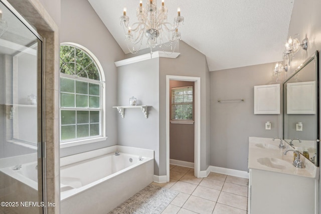 2478 Country Club Blvd, Orange Park, FL 32073 - full bath with a chandelier, vaulted ceiling, a garden tub, double vanity, and healthy amount of natural light