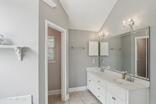 2478 Country Club Blvd, Orange Park, FL 32073 - bathroom with double vanity, tile patterned floors, and baseboards