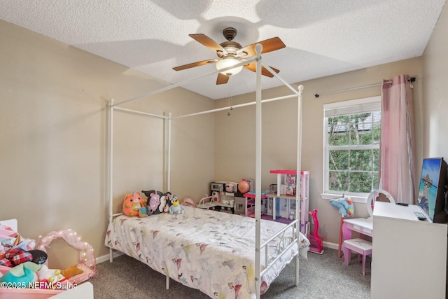 2478 Country Club Blvd, Orange Park, FL 32073 - bedroom featuring carpet floors, baseboards, ceiling fan, and a textured ceiling