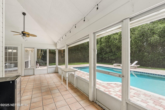 2478 Country Club Blvd, Orange Park, FL 32073 - unfurnished sunroom with a ceiling fan, track lighting, and lofted ceiling